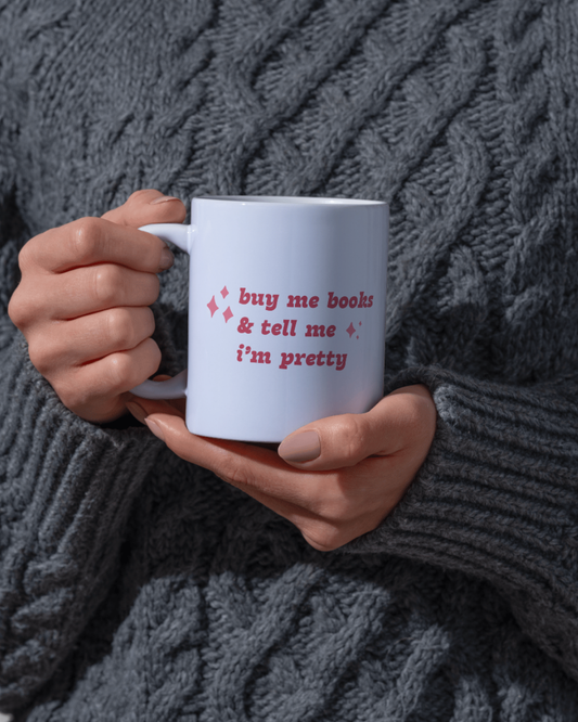 Taza “buy me books…”